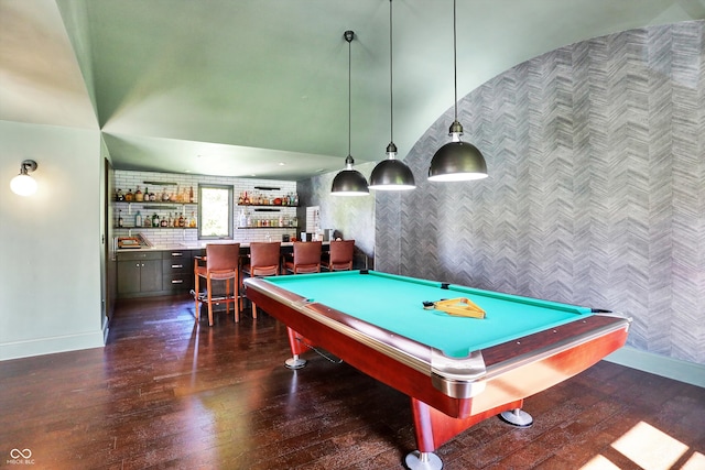 rec room with bar, dark hardwood / wood-style floors, and pool table