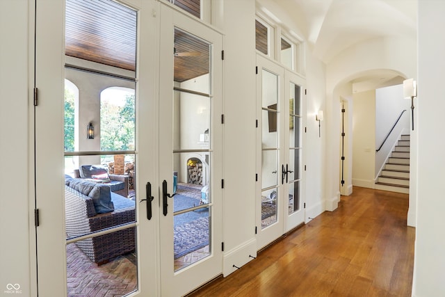 doorway featuring wood-type flooring and french doors