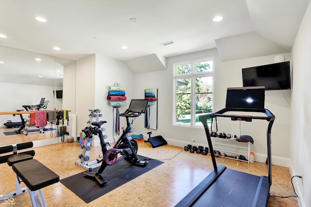 exercise area featuring lofted ceiling