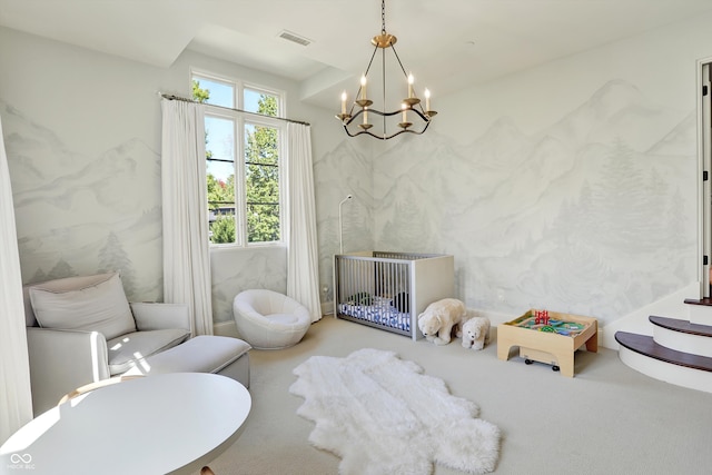 rec room with carpet floors and an inviting chandelier