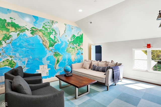 living room featuring lofted ceiling