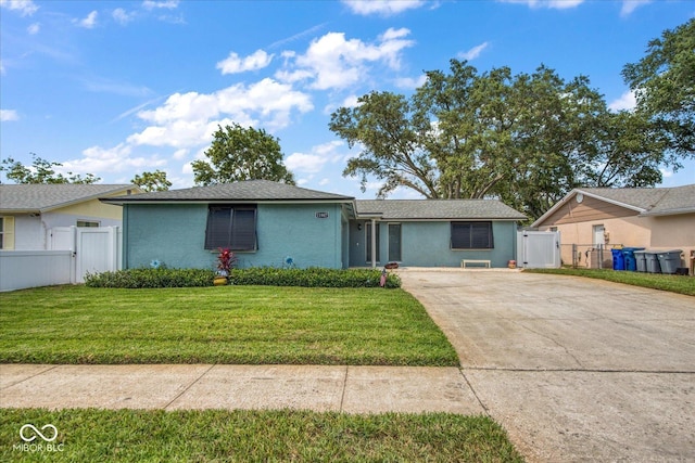 ranch-style house with a front yard