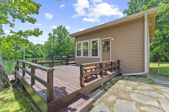 deck featuring a water view