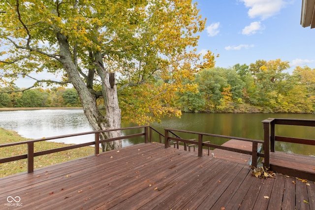 wooden deck with a water view