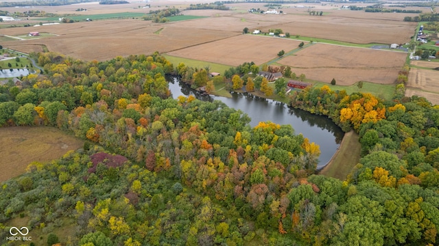 birds eye view of property with a rural view and a water view