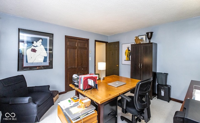 home office with a textured ceiling