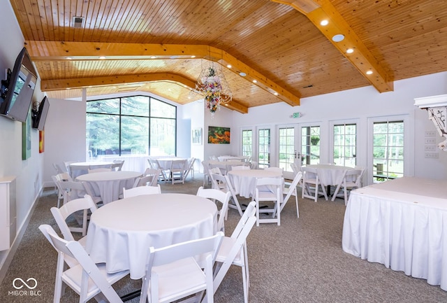 dining space featuring high vaulted ceiling, carpet, wood ceiling, beam ceiling, and french doors