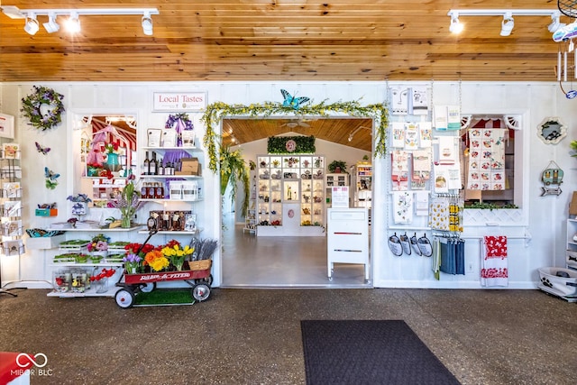 interior space with wood ceiling and vaulted ceiling