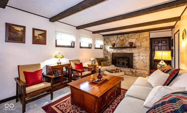 carpeted living room with beamed ceiling