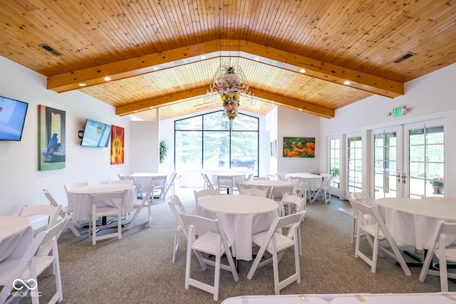 carpeted dining space with wood ceiling, high vaulted ceiling, french doors, and beamed ceiling