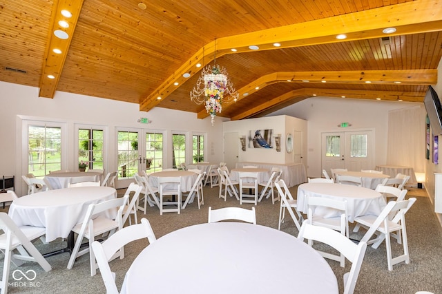 dining room with french doors, wood ceiling, high vaulted ceiling, and beamed ceiling