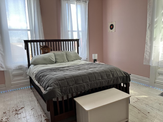 bedroom with light wood-type flooring