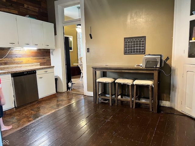 kitchen with white cabinets, dark hardwood / wood-style floors, ceiling fan, and dishwasher