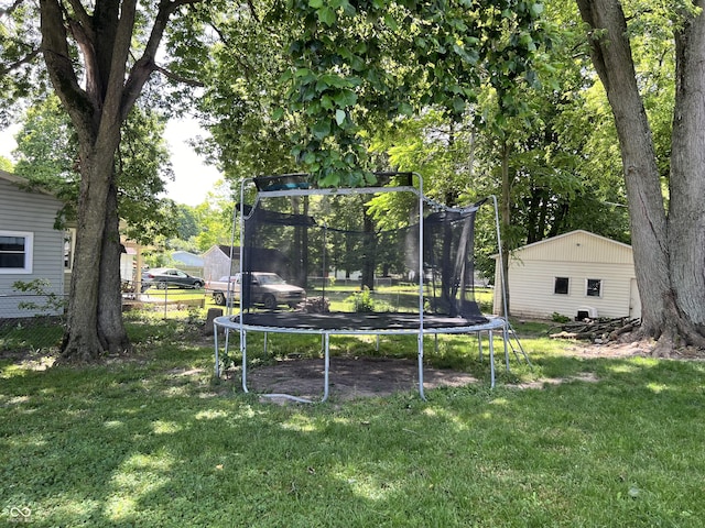 view of yard featuring a trampoline