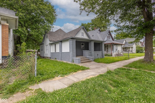 view of home's exterior with a lawn