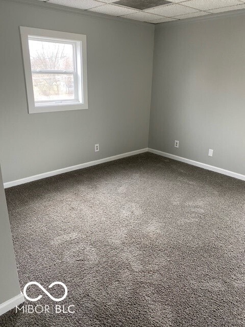 2976 N Scatterfield Rd, Anderson, IN 46012 - carpeted spare room featuring baseboards