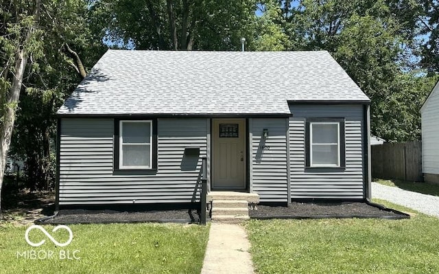 view of front of property with a front lawn