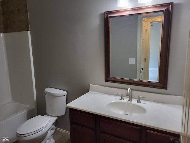 full bathroom featuring vanity,  shower combination, and toilet