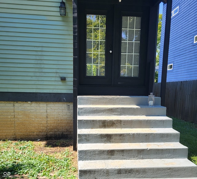 entrance to property featuring french doors