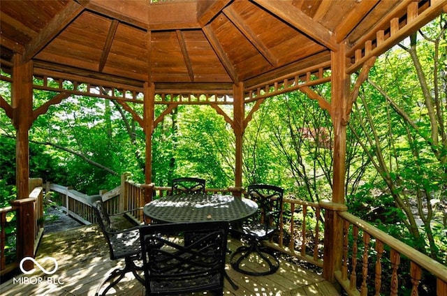 wooden terrace with a gazebo