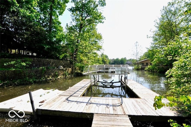 view of dock with a water view