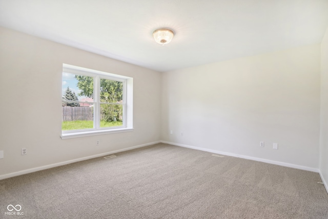 view of carpeted spare room