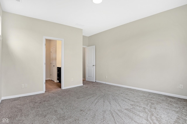 unfurnished bedroom featuring carpet floors