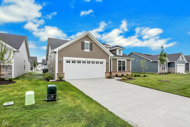 view of front of home with a garage and a front lawn