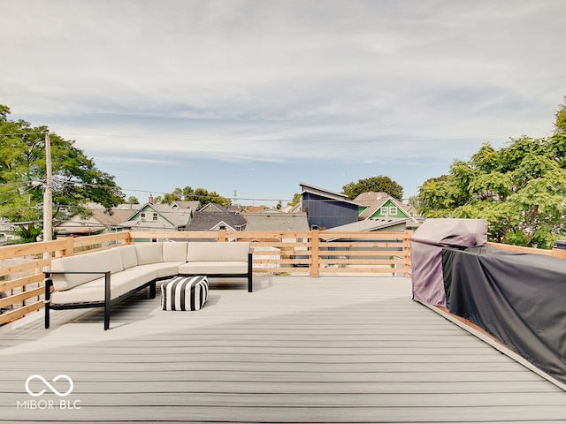 deck with an outdoor hangout area