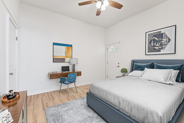 bedroom featuring light wood-type flooring and ceiling fan