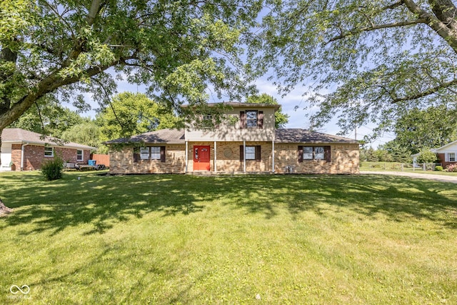 view of front of home with a front lawn