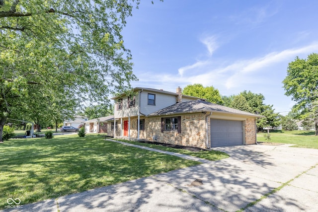 view of front property with a front lawn and a garage