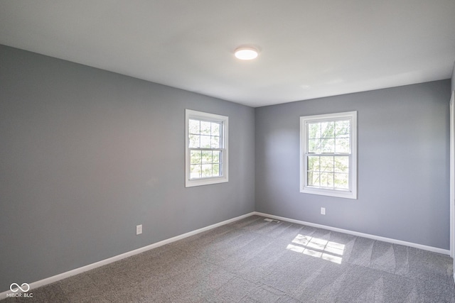 view of carpeted spare room