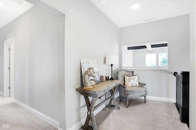 sitting room with carpet flooring, visible vents, and baseboards