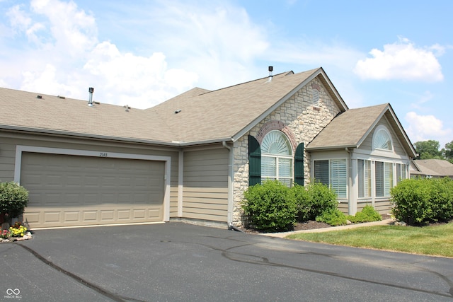 ranch-style house with a garage