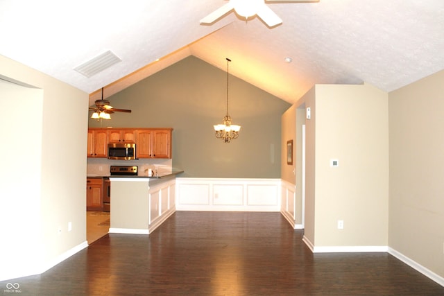 unfurnished living room with ceiling fan with notable chandelier, dark wood-type flooring, high vaulted ceiling, and a textured ceiling