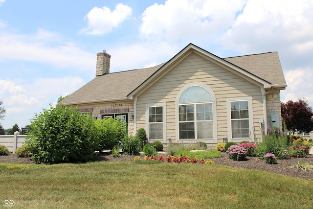 exterior space featuring a front lawn