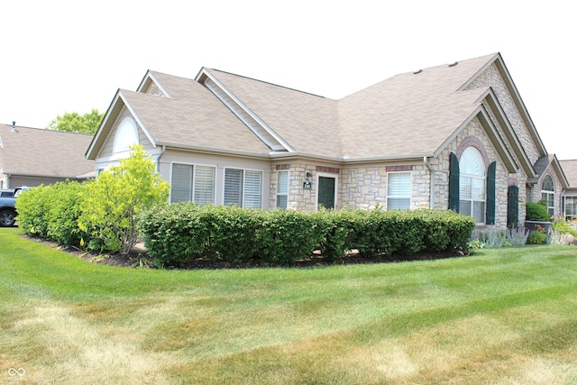 view of home's exterior with a yard