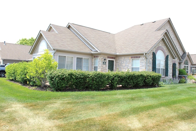 view of home's exterior featuring a yard