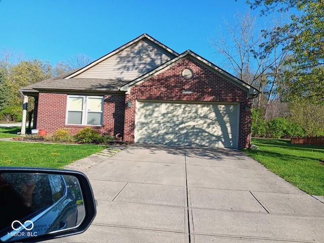 view of front of house featuring a garage and a front yard