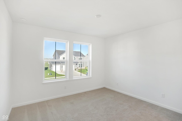 view of carpeted spare room