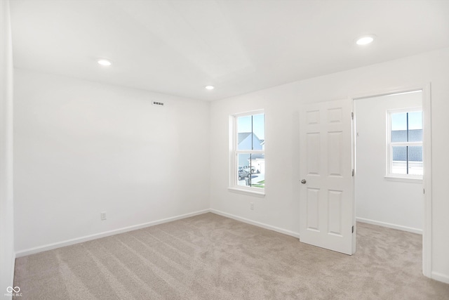 view of carpeted spare room