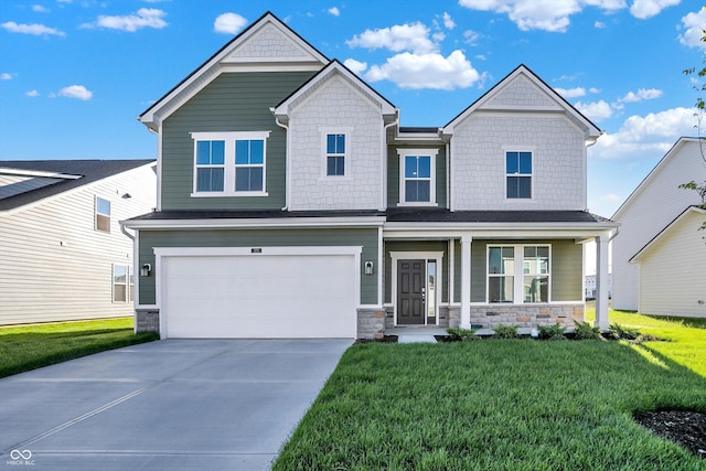 craftsman-style house with a front yard, a garage, and covered porch