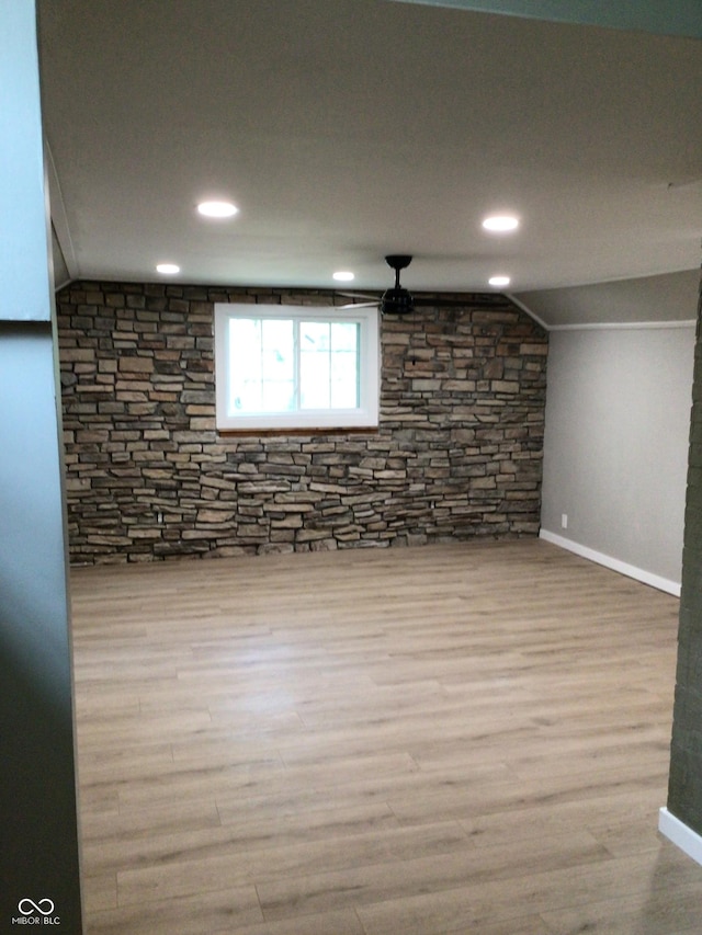 basement featuring light hardwood / wood-style flooring