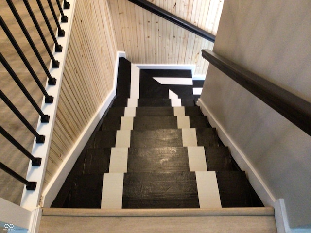 stairway with wooden walls