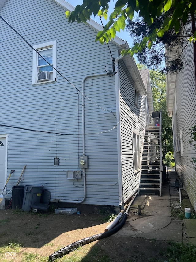 view of home's exterior featuring cooling unit