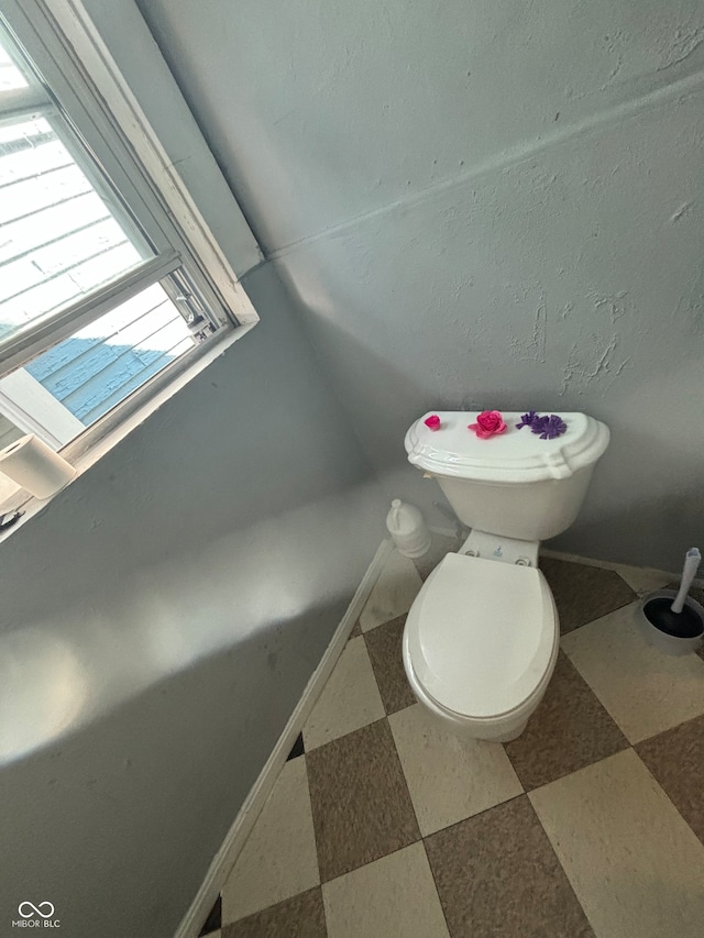 bathroom featuring toilet