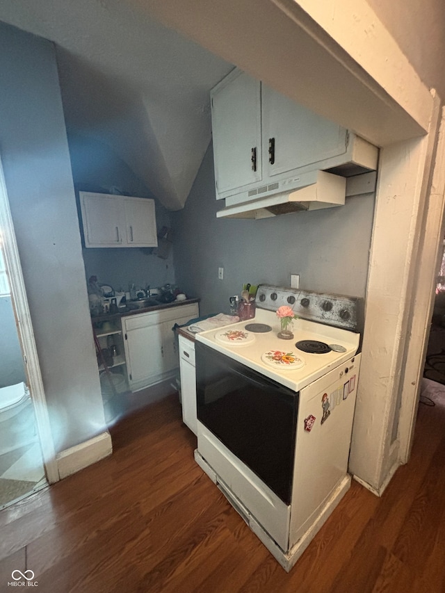 kitchen featuring dark hardwood / wood-style flooring, white cabinetry, and electric stove