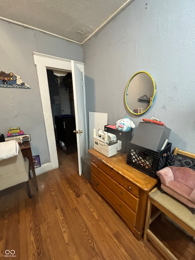 bedroom with wood-type flooring