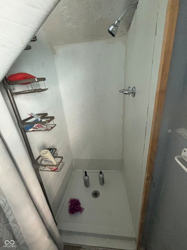 bathroom with a textured ceiling